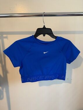 Nike Royal Blue Cropped Performance Tee with White Swoosh